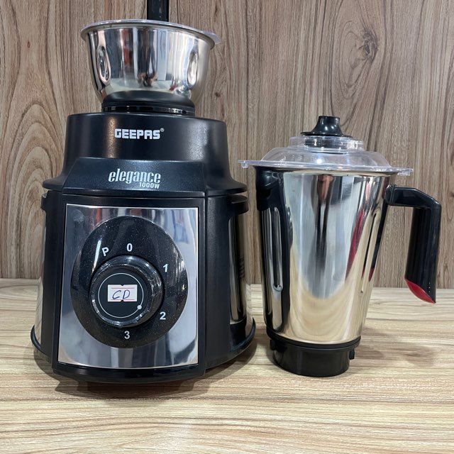 Discover the Geepas 5-in-1 Mixer Grinder GSB5457N, a powerful kitchen appliance that combines grinding, blending, juicing, and more. With its compact design and durable construction, it's the perfect tool for all your food preparation needs!