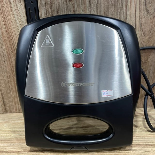 Experience the versatility of the WestPoint Sandwich Toaster 3 in 1 WF-6093. This multifunctional appliance serves as a sandwich toaster, waffle maker, and grill, featuring quick heating, non-stick plates, and cool-touch housing. Perfect for space-saving storage in any kitchen!